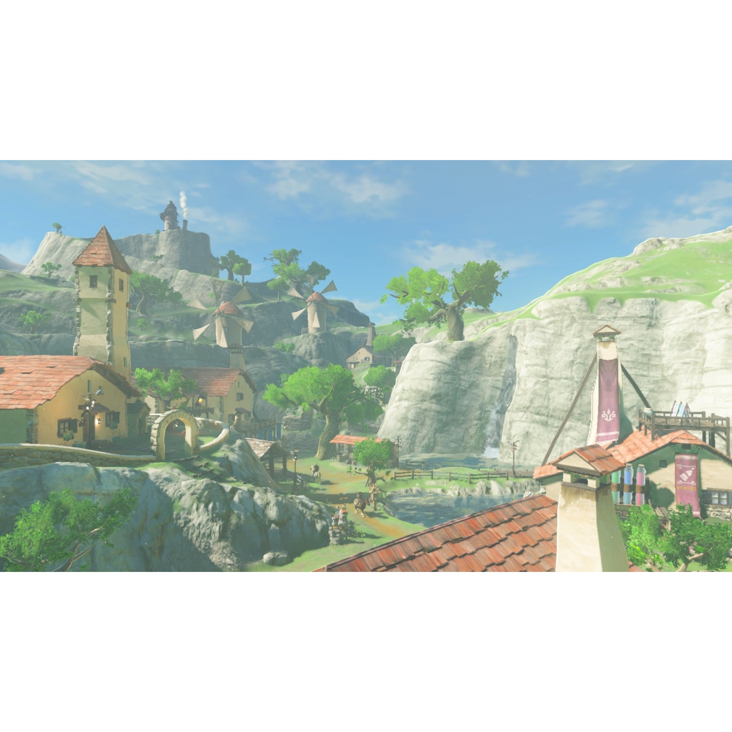 A quaint village with windmills and stone buildings sits below rolling green hills.