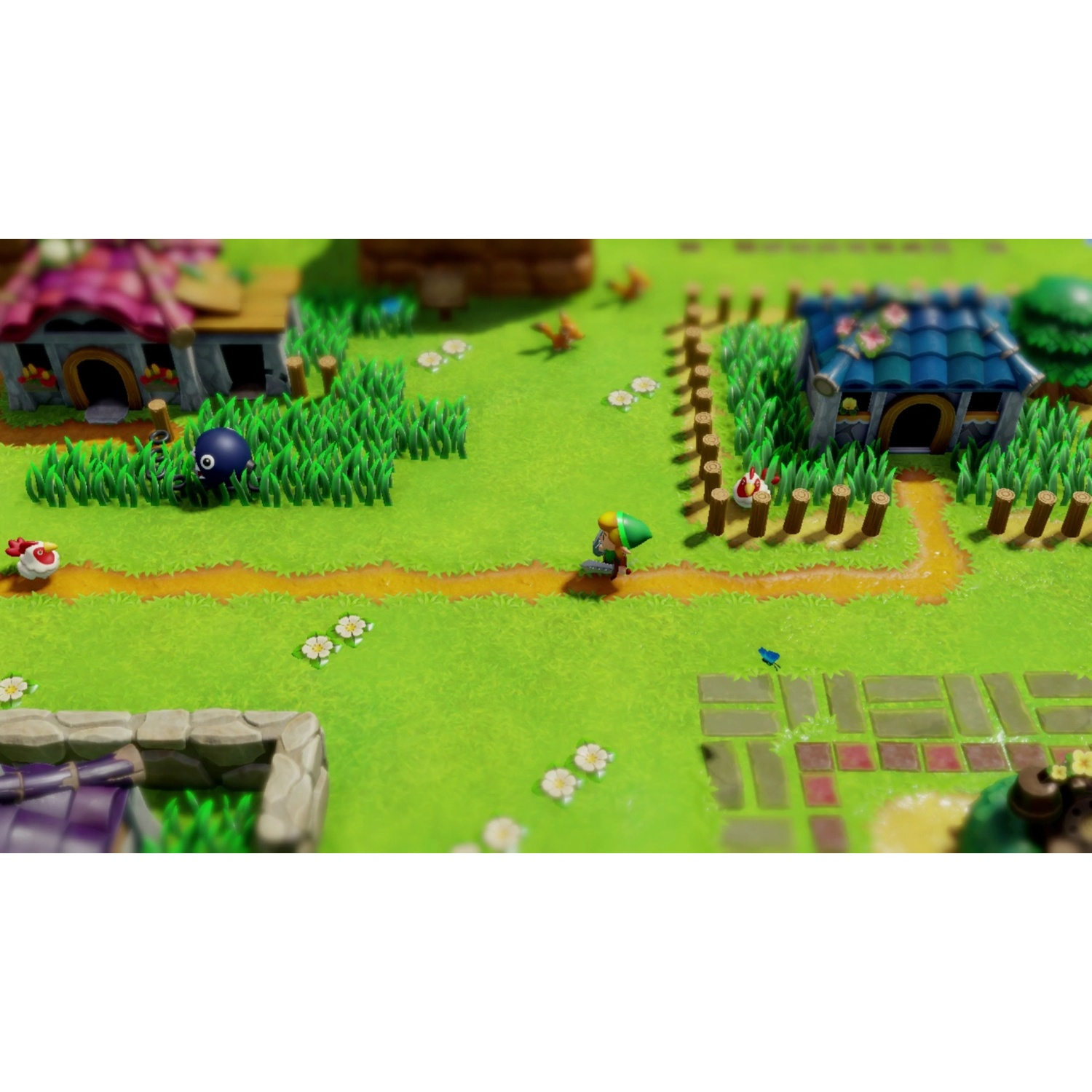 Link with green hat and cape walks on a path through a green landscape with houses and monsters.