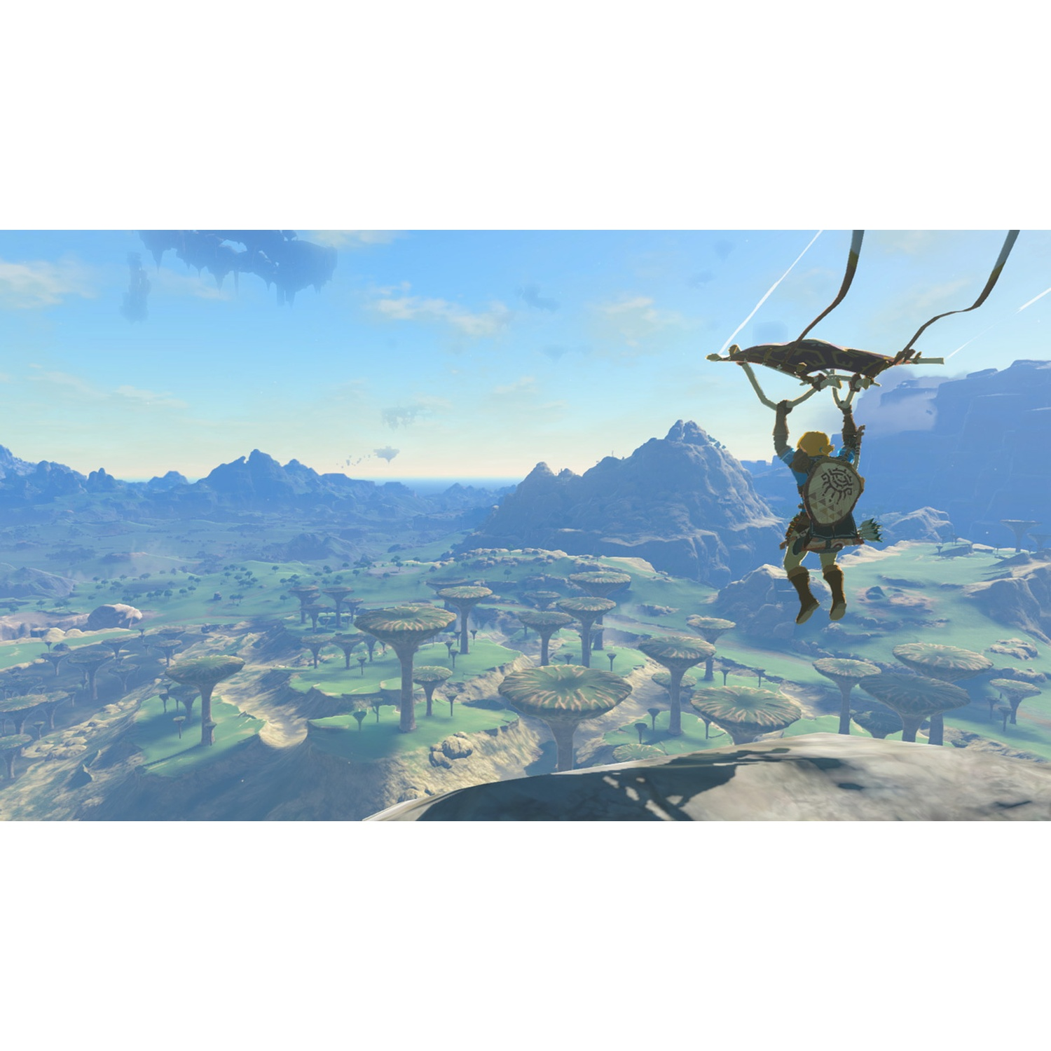 A man with a paraglider flies over a green landscape with mushroom trees.
