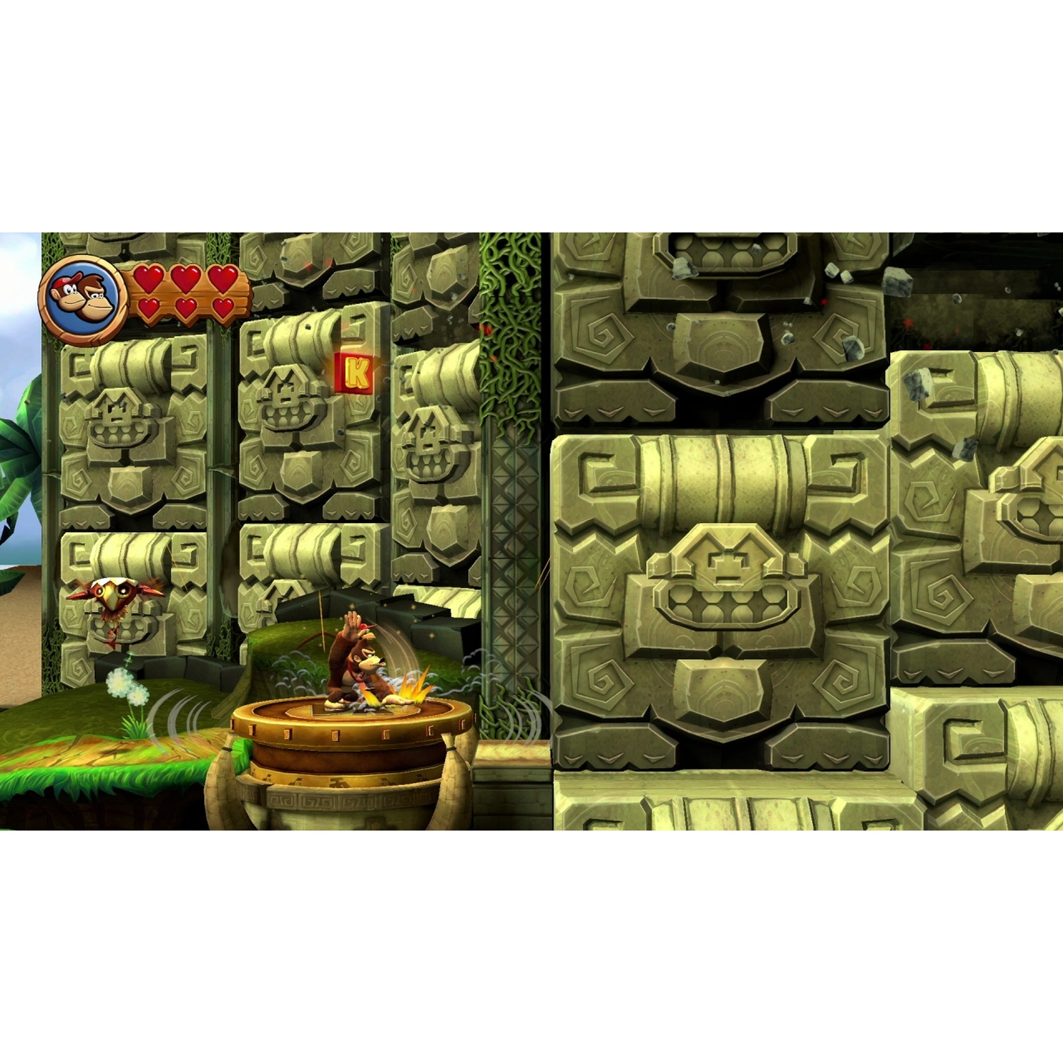 Donkey Kong sur une plateforme dorée frappant, avec un ennemi et des blocs de pierre.