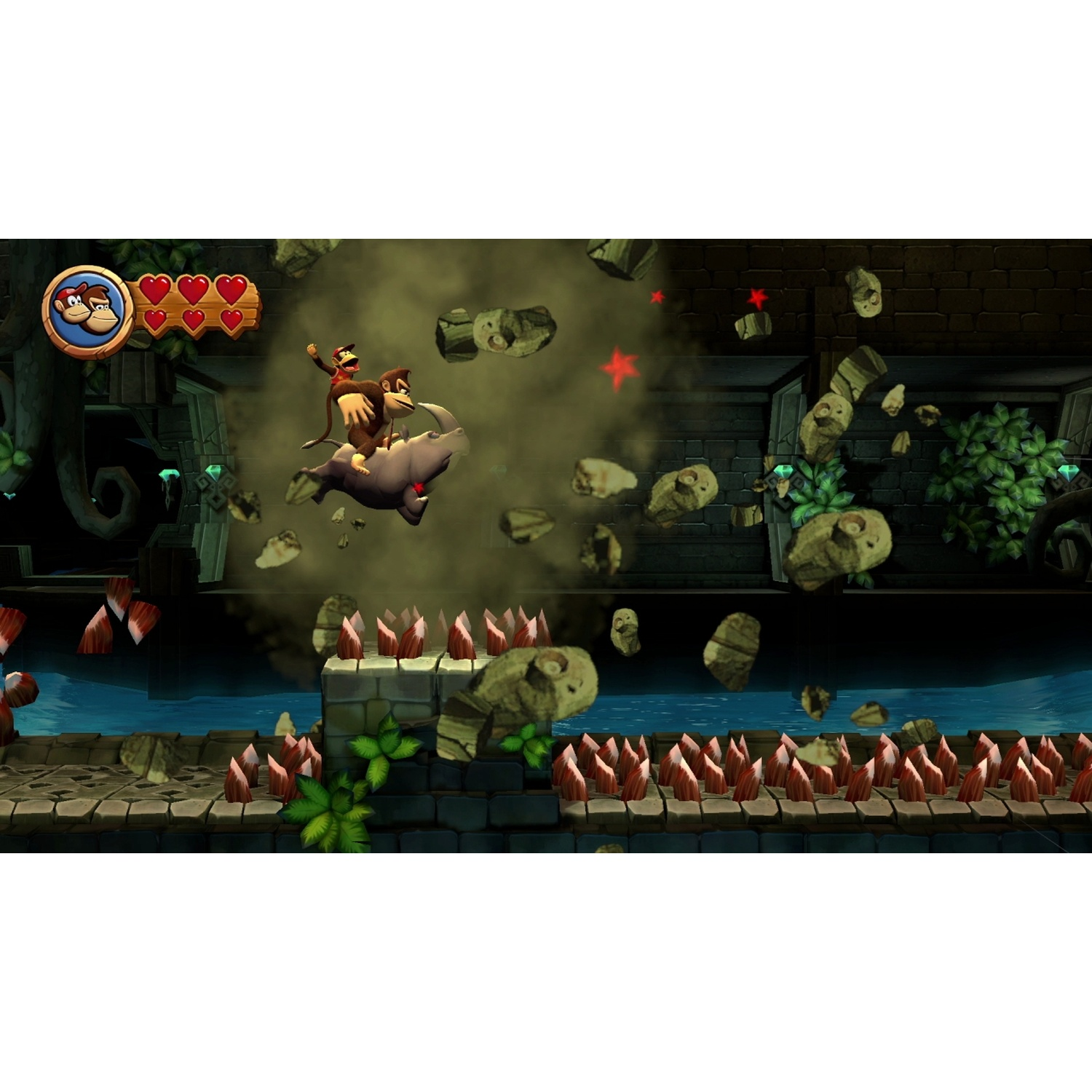 Donkey Kong monte un rhinocéros, esquivant rochers et étoiles rouges dans un niveau.