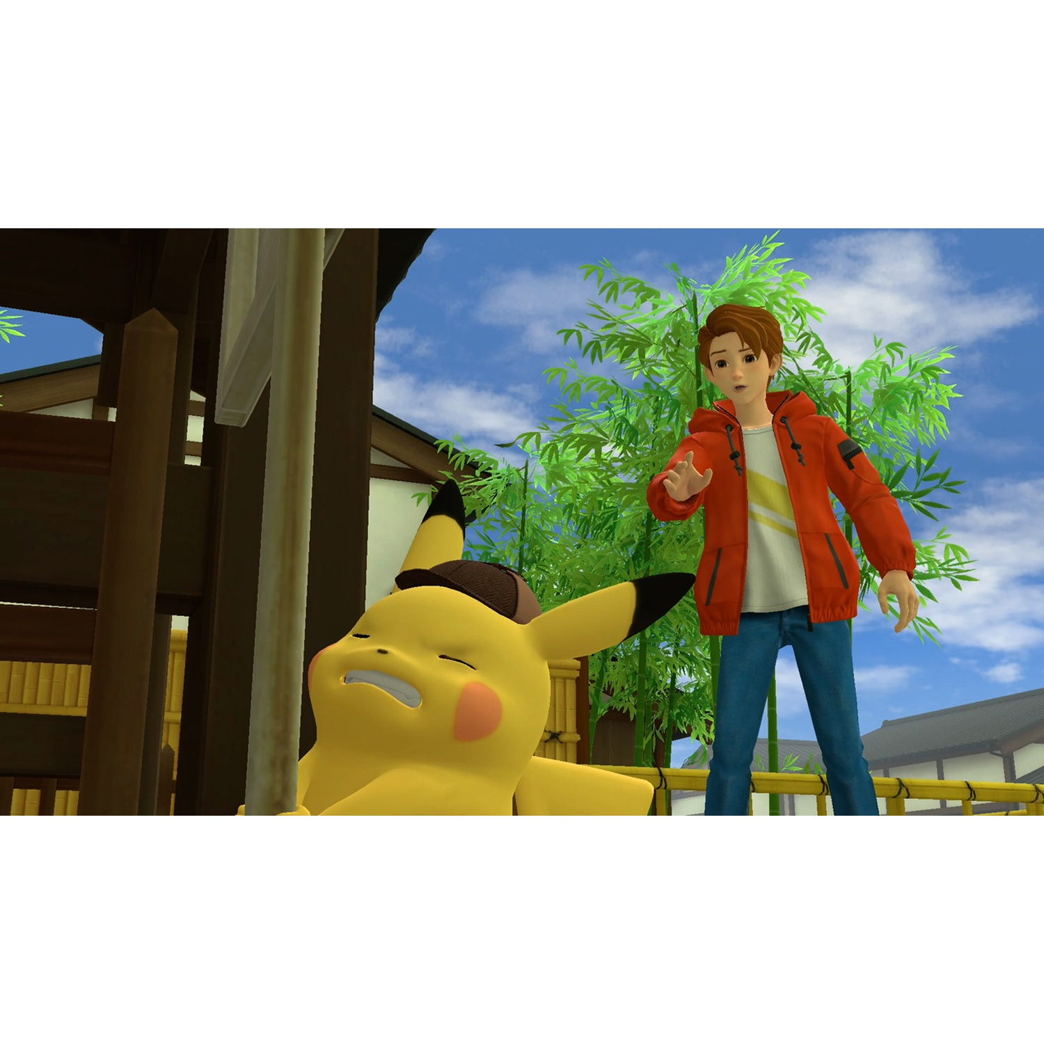 A boy in a red jacket and Pikachu wearing a detective hat lie on the ground.