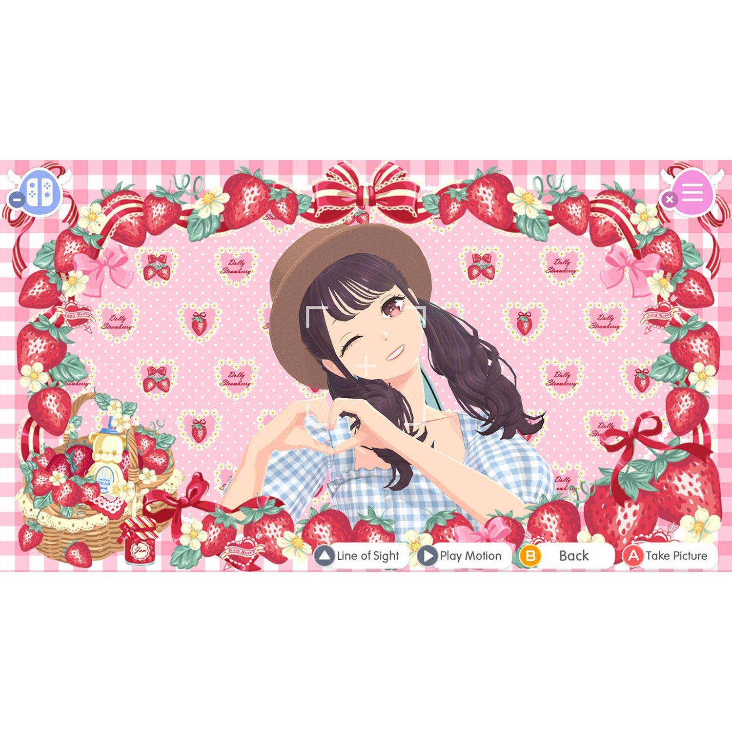 A girl in a hat forms a heart shape with her hands in front of a strawberry background.