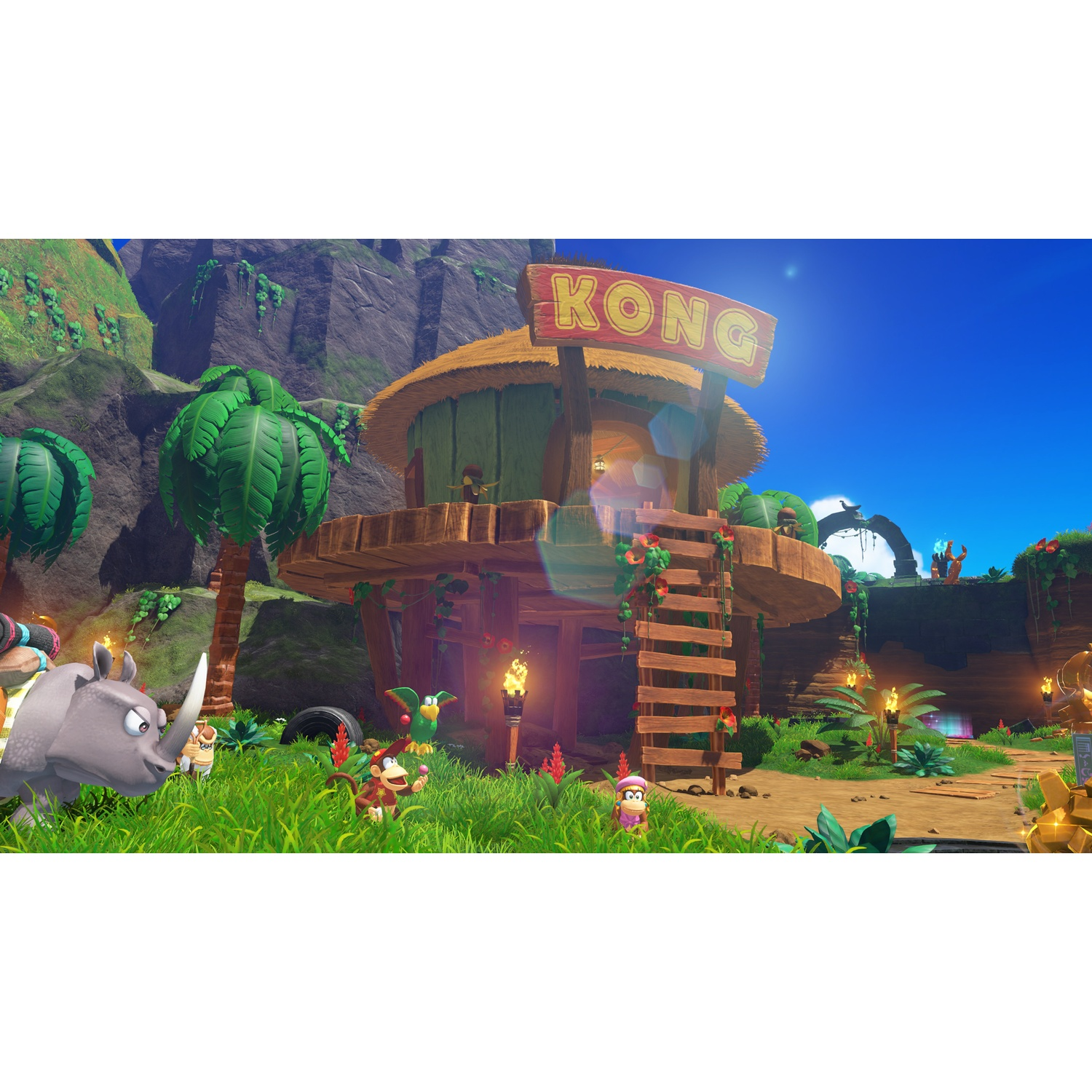 A rhino, monkeys, and a parrot in front of a treehouse with a KONG sign.