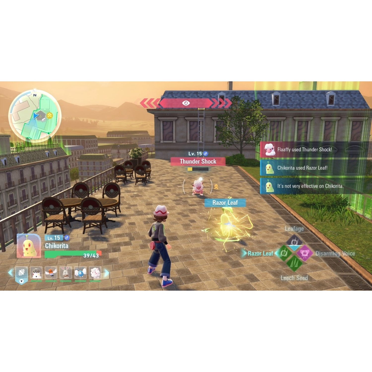 A trainer battles Flaaffy with Chikorita in a city setting.