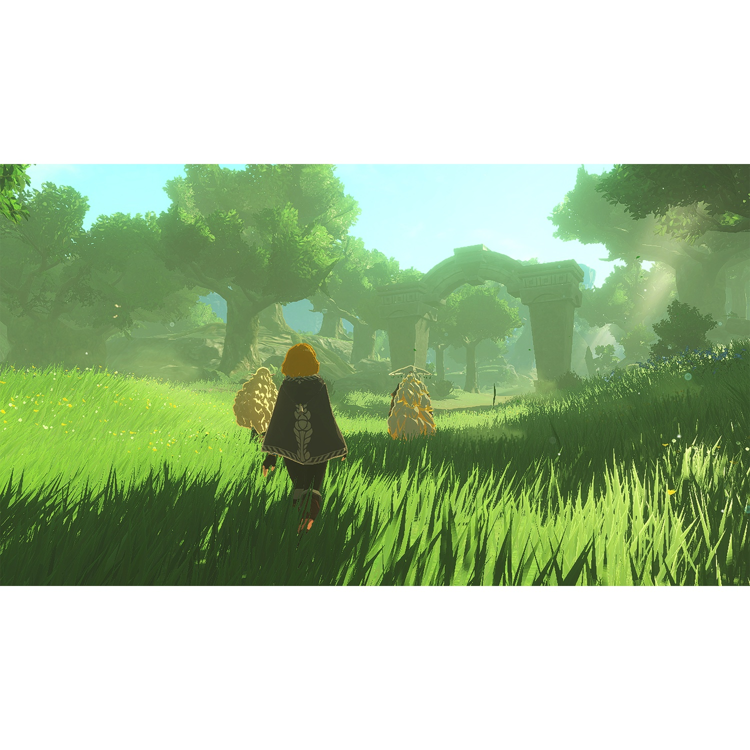 A person with blonde hair walks through a grassy field towards ancient ruins.