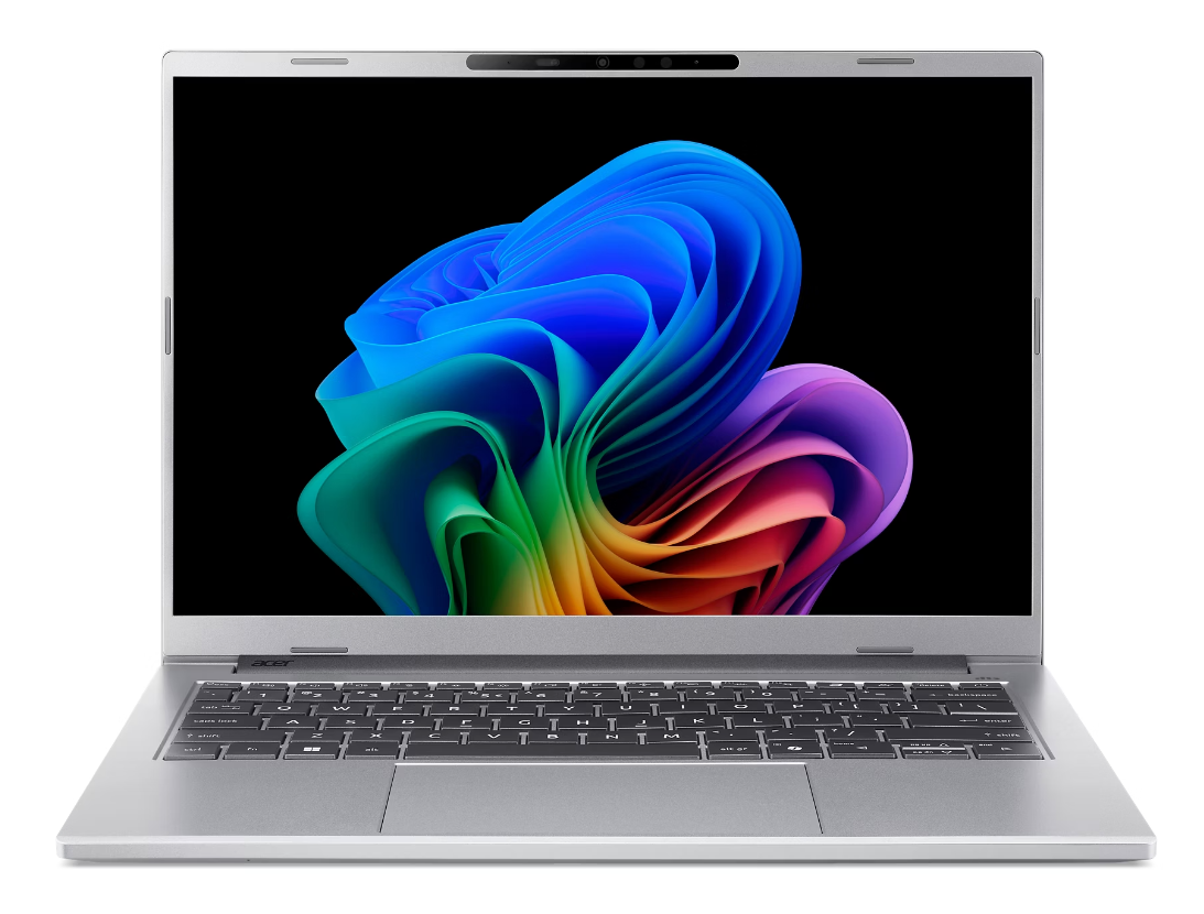 Otwarty laptop wyświetlający kolorową grafikę abstrakcyjną na ekranie.