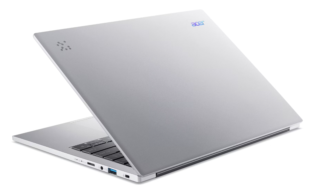 Srebrny laptop Acer z otwartą pokrywą, pokazujący klawiaturę i porty.