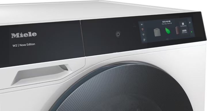 Pralka Miele W2 Nova Edition z cyfrowym wyświetlaczem i bębnem.