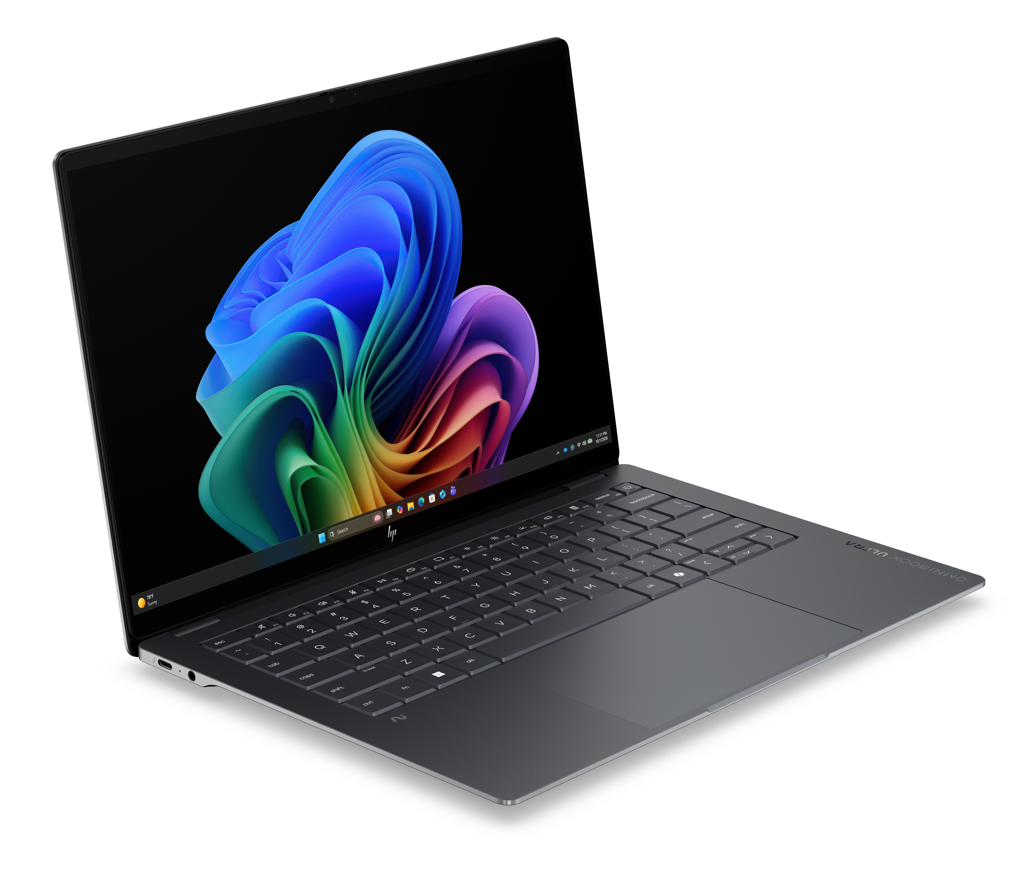 Szary laptop HP z otwartą pokrywą, wyświetlający kolorową tapetę systemu Windows.