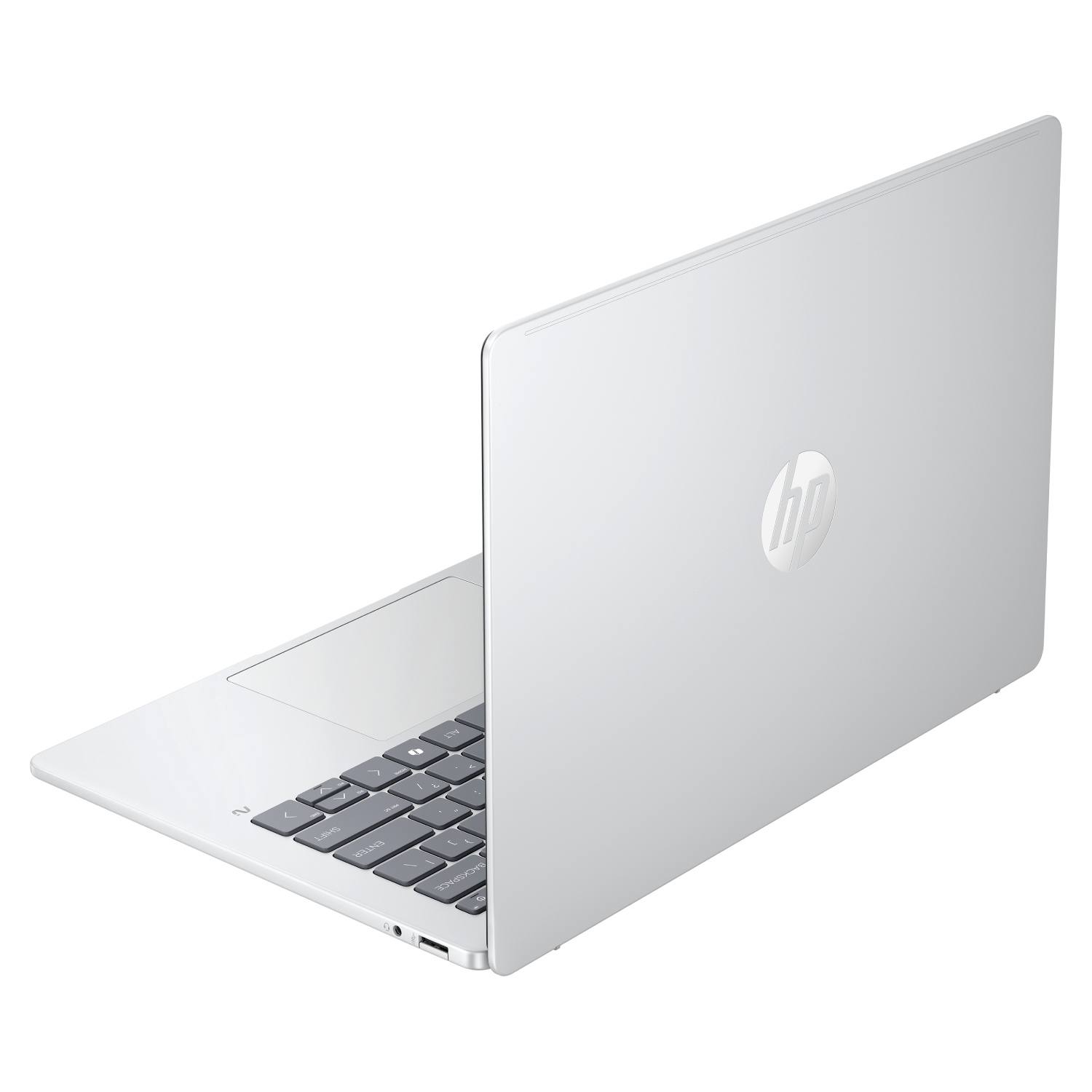 Un portátil HP plateado sobre fondo blanco, parcialmente abierto.