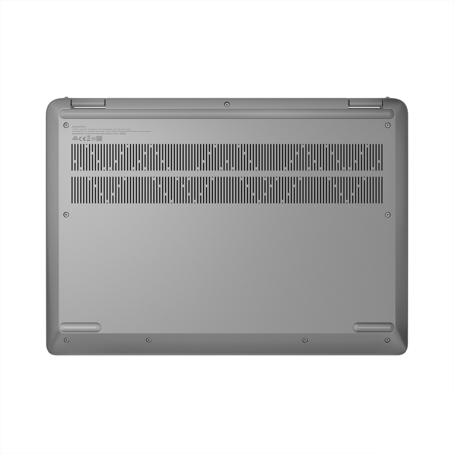 Parte inferiore di un laptop grigio con prese d'aria ed etichette.