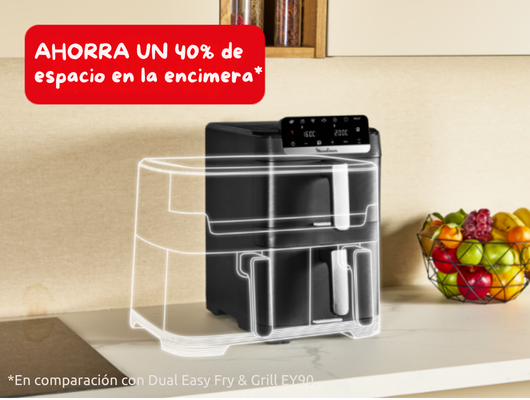 Freidora de aire negra de doble cámara en encimera, con frutero al lado.