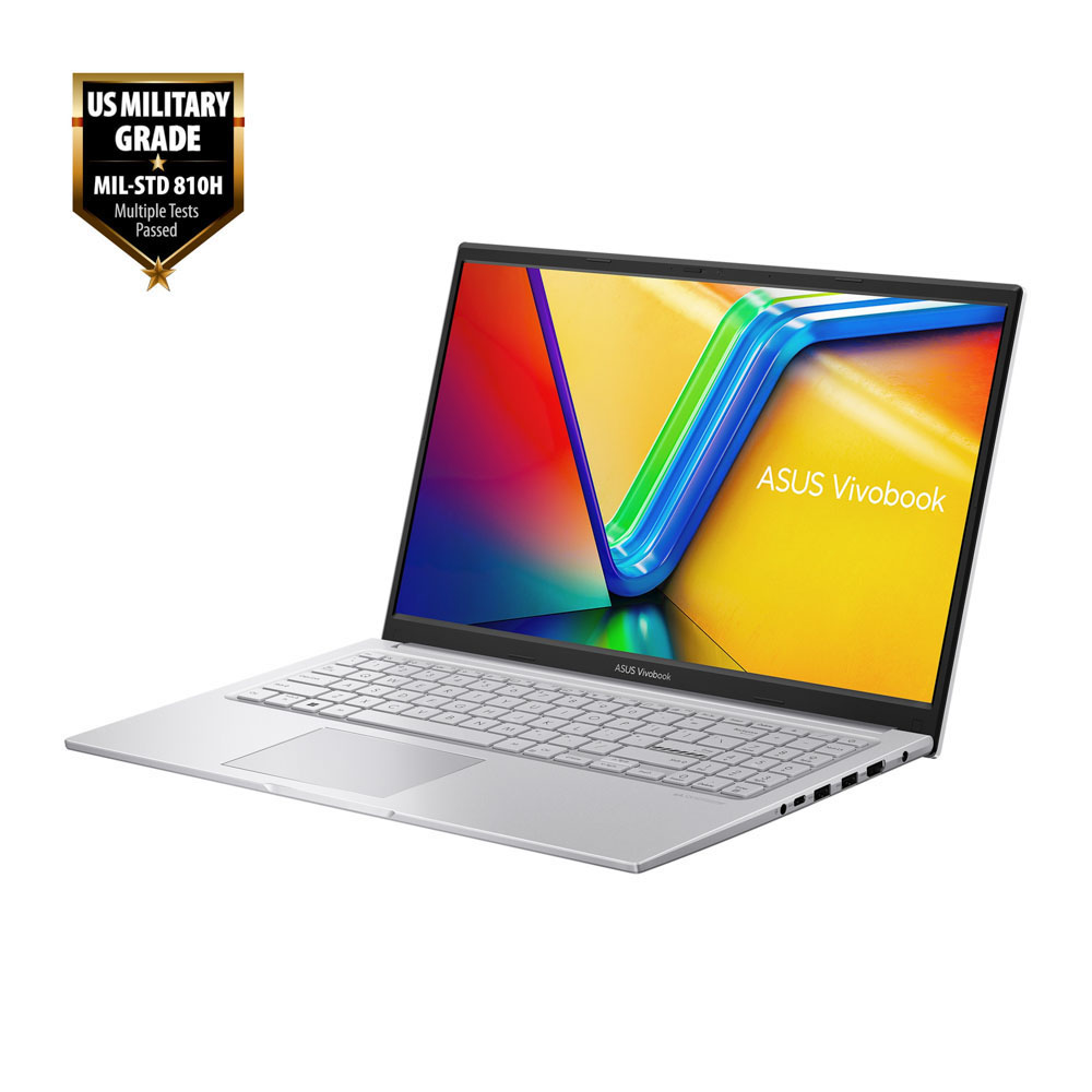 Beyaz arka planda "US MILITARY GRADE" damgalı gümüş renkli Asus Vivobook dizüstü bilgisayar.