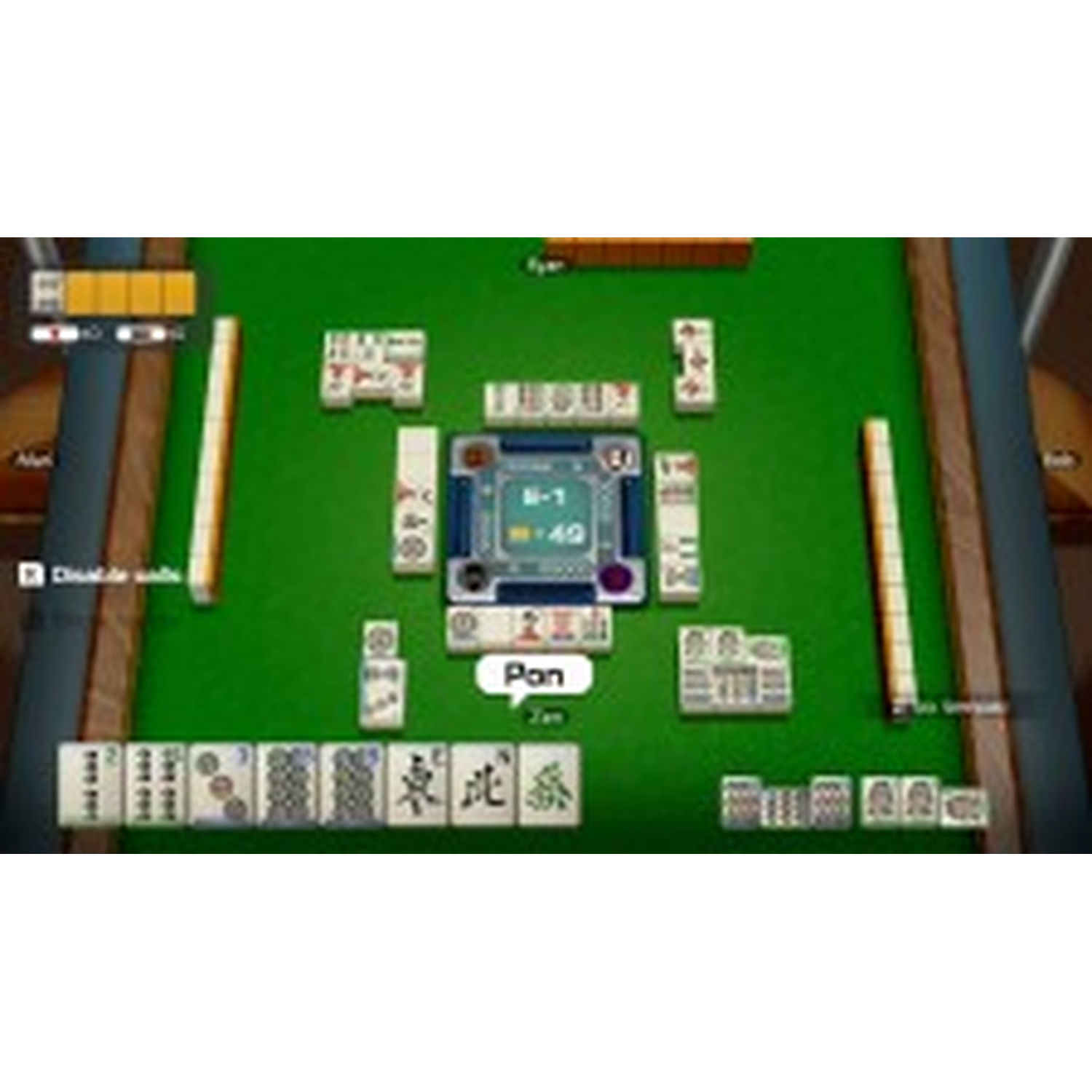 Een Mahjongspel op een groen vilt oppervlak met veel tegels.