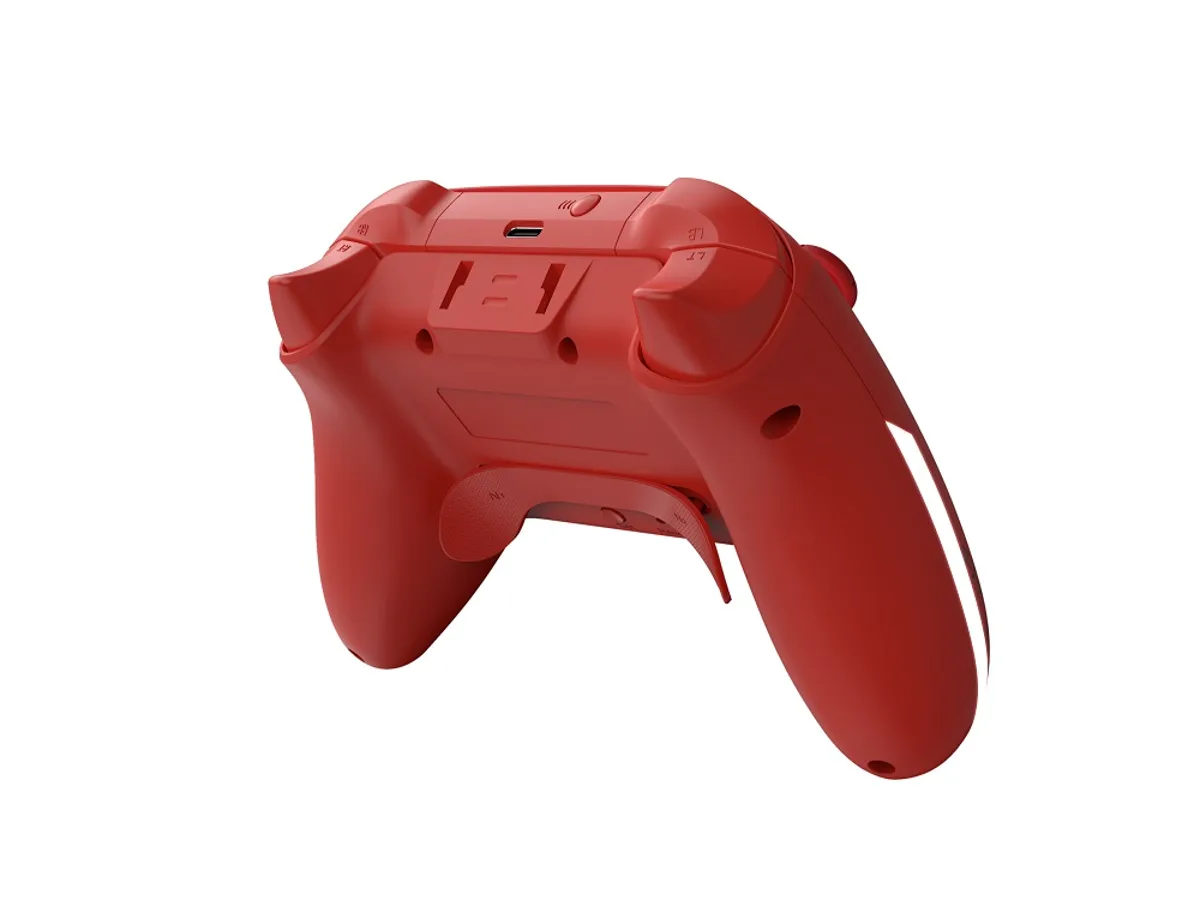 Rote Spielkonsole von hinten mit Anschlüssen und Knöpfen.