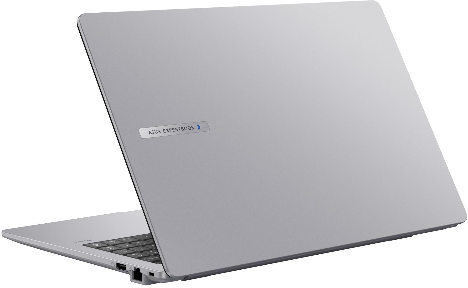 Ezüst Asus Expertbook laptop, részben nyitva, billentyűzettel és portokkal.