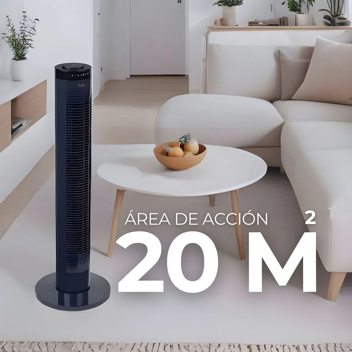 Un elegante ventilador de torre oscuro junto a una mesa de centro blanca con fruta en un cuenco.