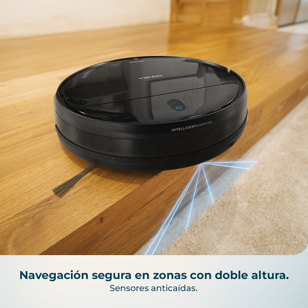 Un robot aspirador negro con líneas azules que indican una caída.