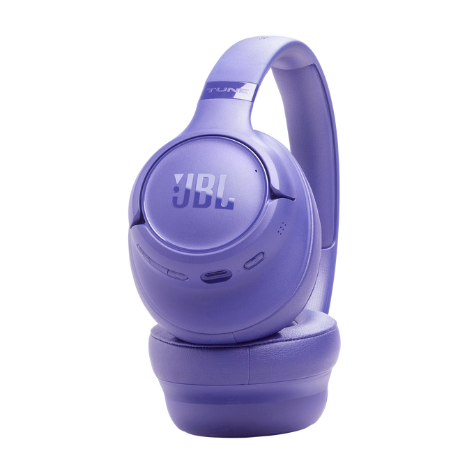 Lila JBL fejhallgató "TUNE" felirattal, izolált.
