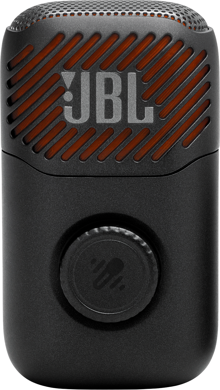 Enceinte JBL noire avec grille orange et bouton rotatif.