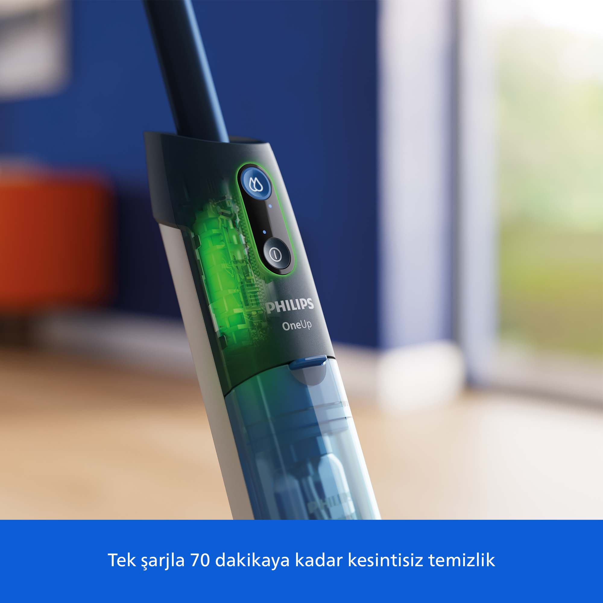 Şeffaf toz haznesi ve yeşil aydınlatmalı Philips elektrikli süpürge yakın çekimi.