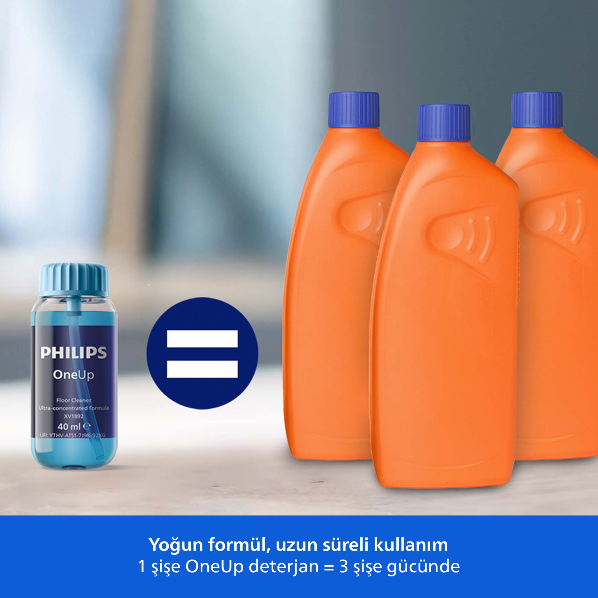 Philips OneUp yer temizleyici şişesi, üç turuncu şişenin yanında. Eşittir işareti grafiği.