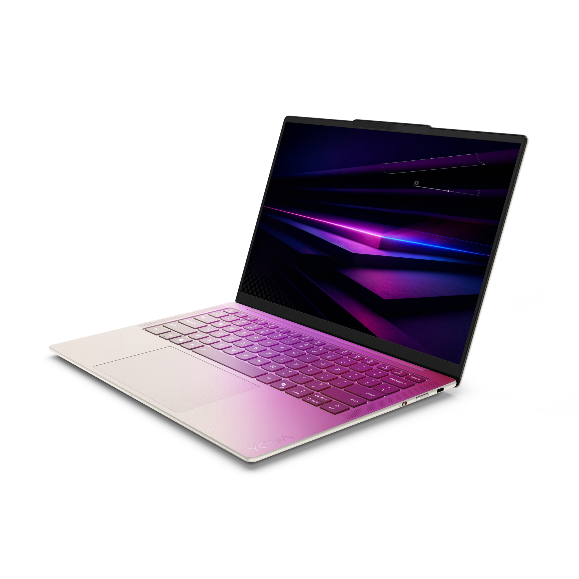 Ein geschlossenes hellbeiges Laptop mit einem pink-violetten Tastaturhintergrund.