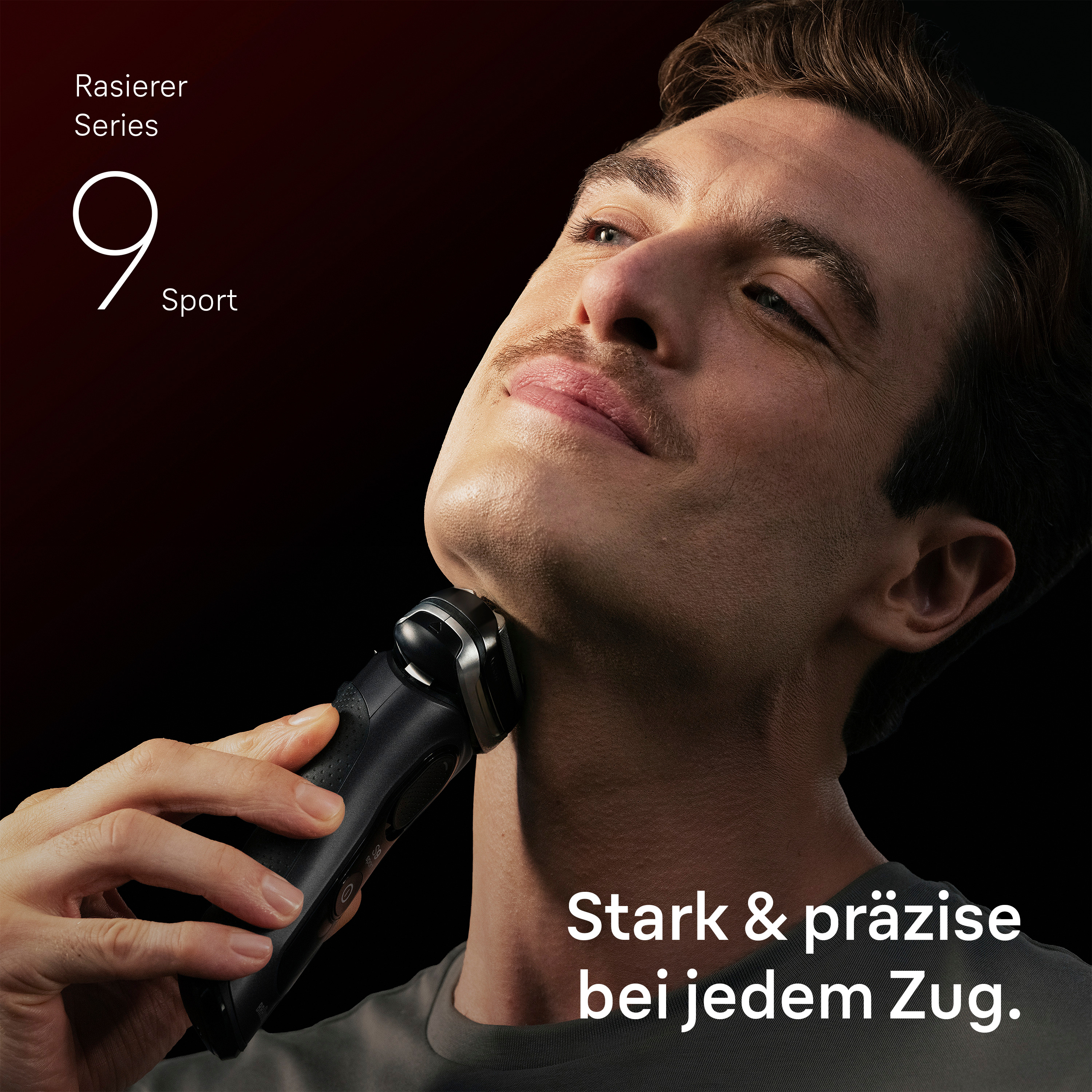 Mann rasiert sich mit einem schwarzen Elektrorasierer. Serie 9 Sport.
