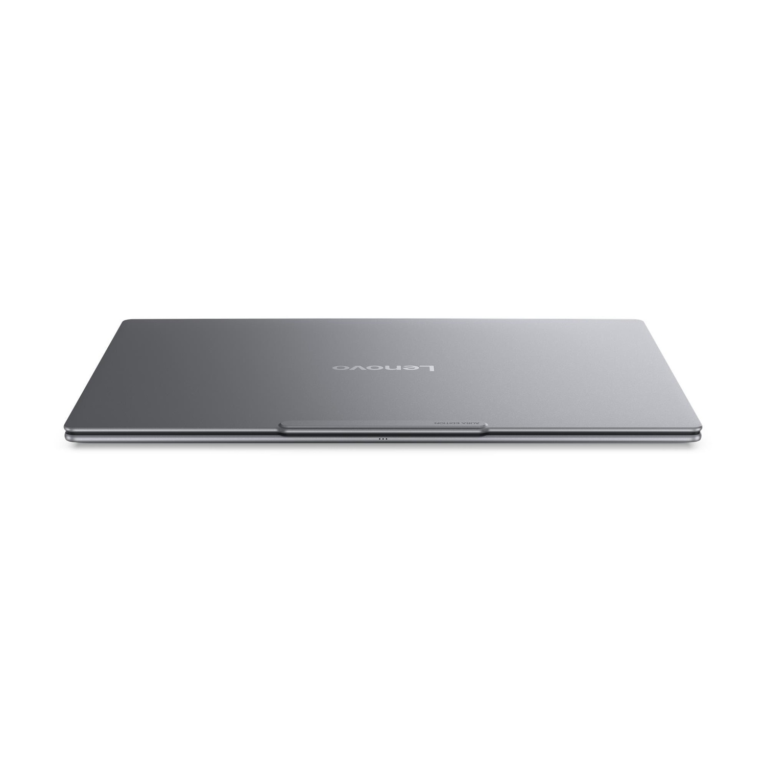 Un laptop Lenovo grigio chiuso su sfondo bianco.