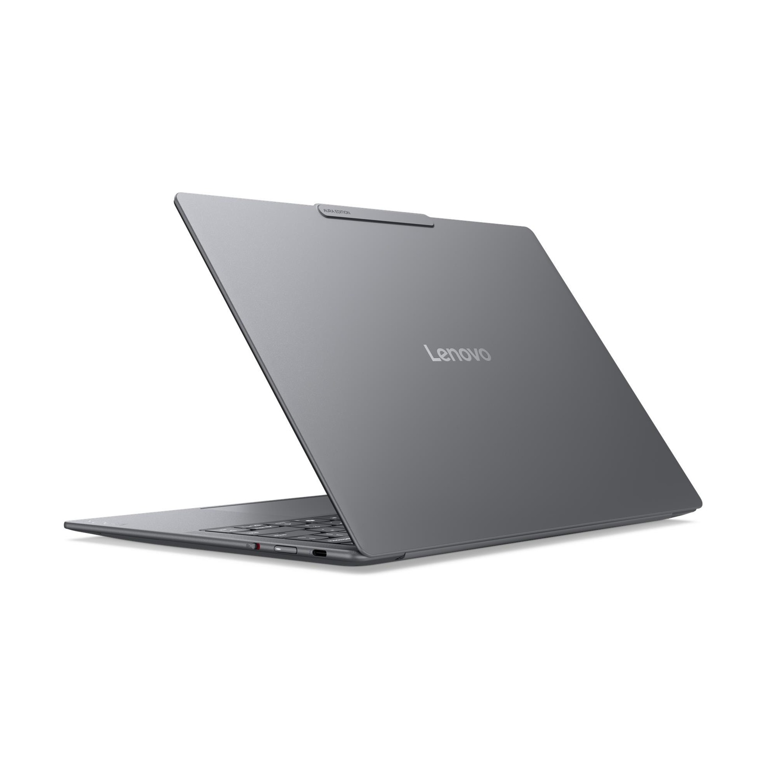 Un laptop Lenovo grigio aperto ad angolo, con tastiera e porte visibili.