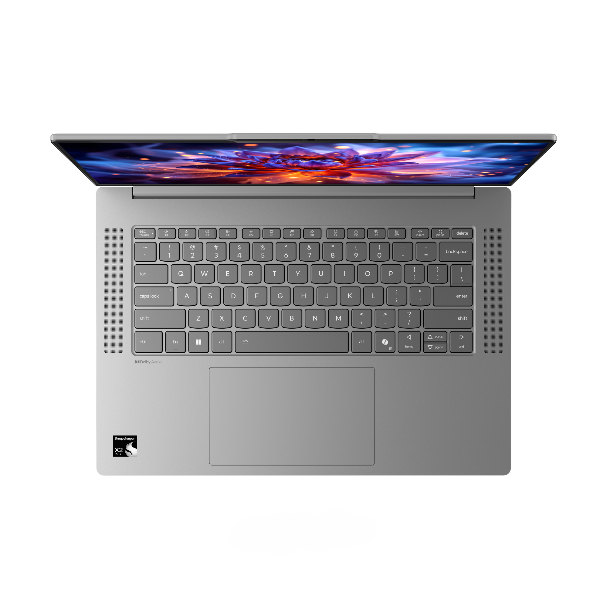 Un laptop argento con uno sfondo astratto e illuminato sullo schermo.