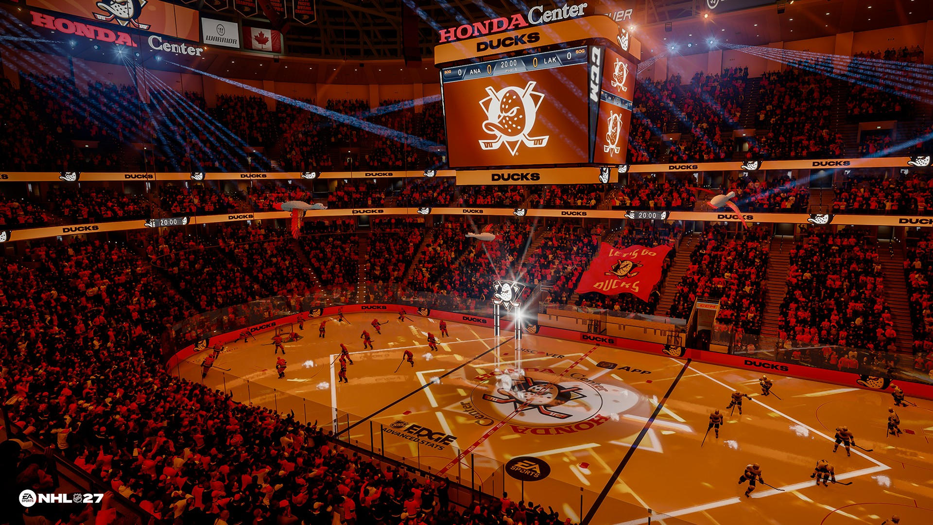 Eishockeyarena mit vielen Zuschauern, Spielern auf dem Eis und einer Anzeigetafel.