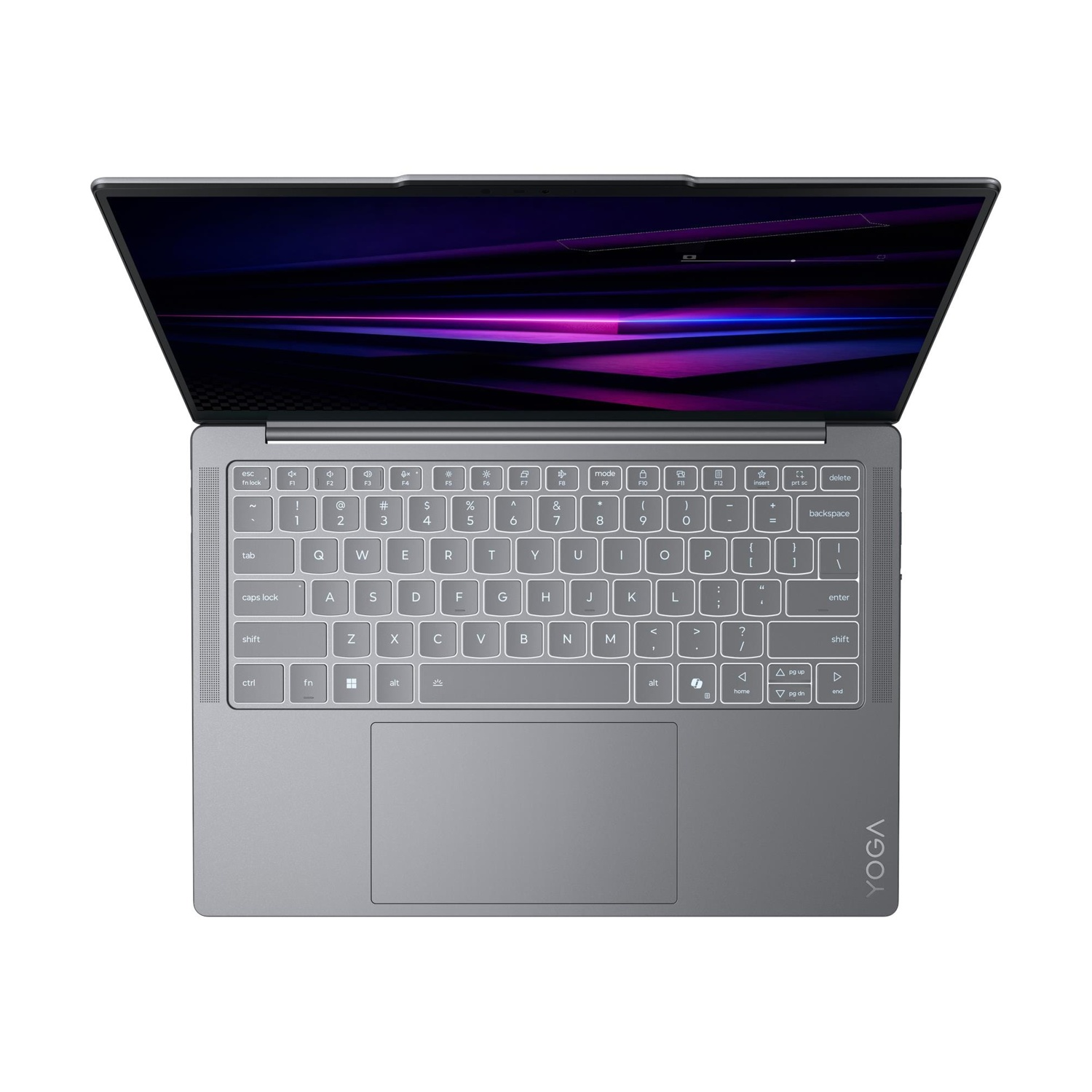Un laptop grigio aperto con tastiera retroilluminata e sfondo colorato.