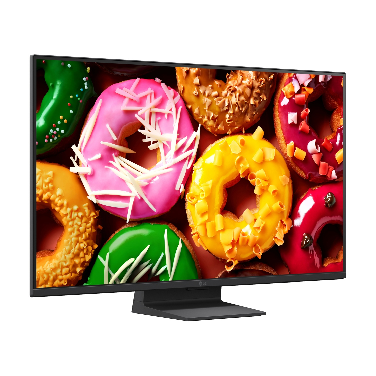 Un monitor mostra ciambelle colorate con glassa e codette.