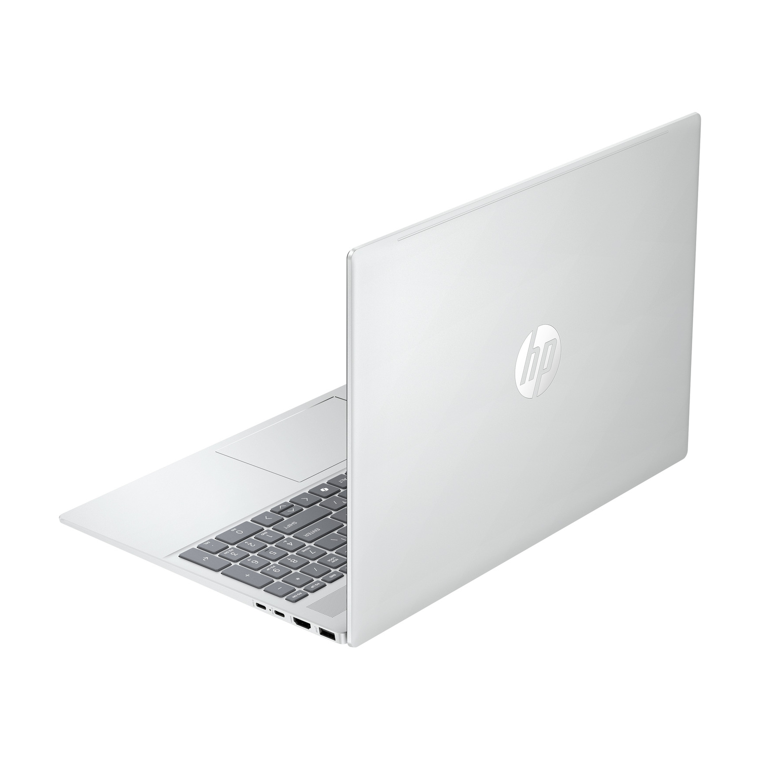 Un laptop HP argentato aperto che mostra tastiera e porte.