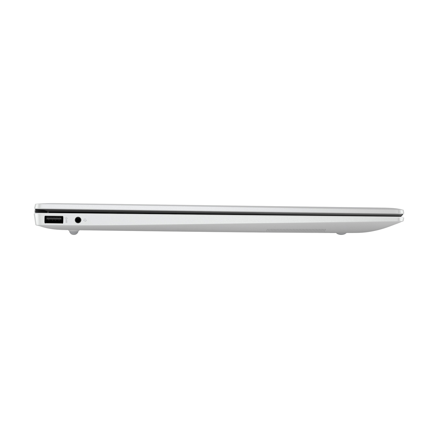 Laptop argentato chiuso su sfondo bianco, vista laterale.
