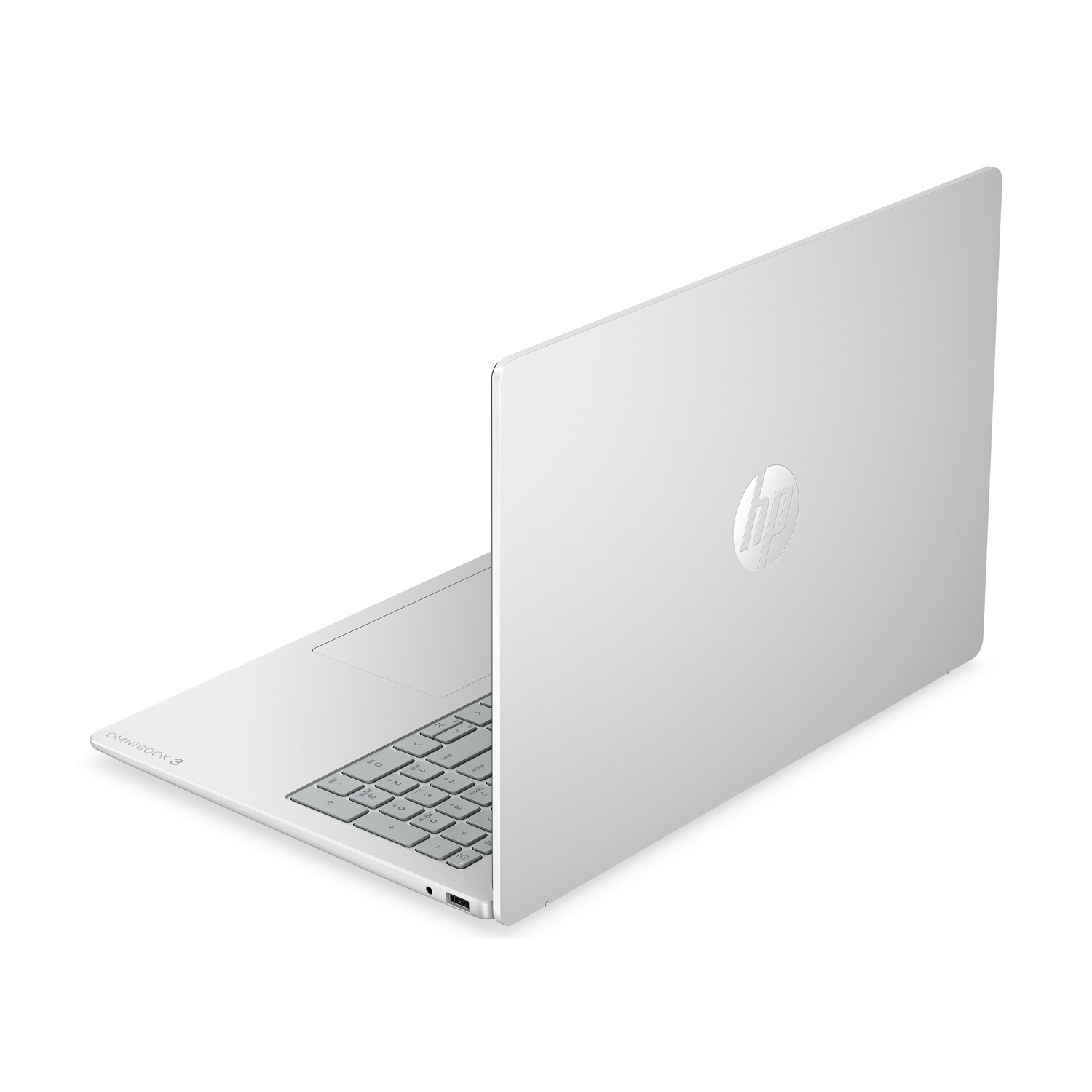 Un laptop HP argentato con scritta Omnibook 3 è aperto.