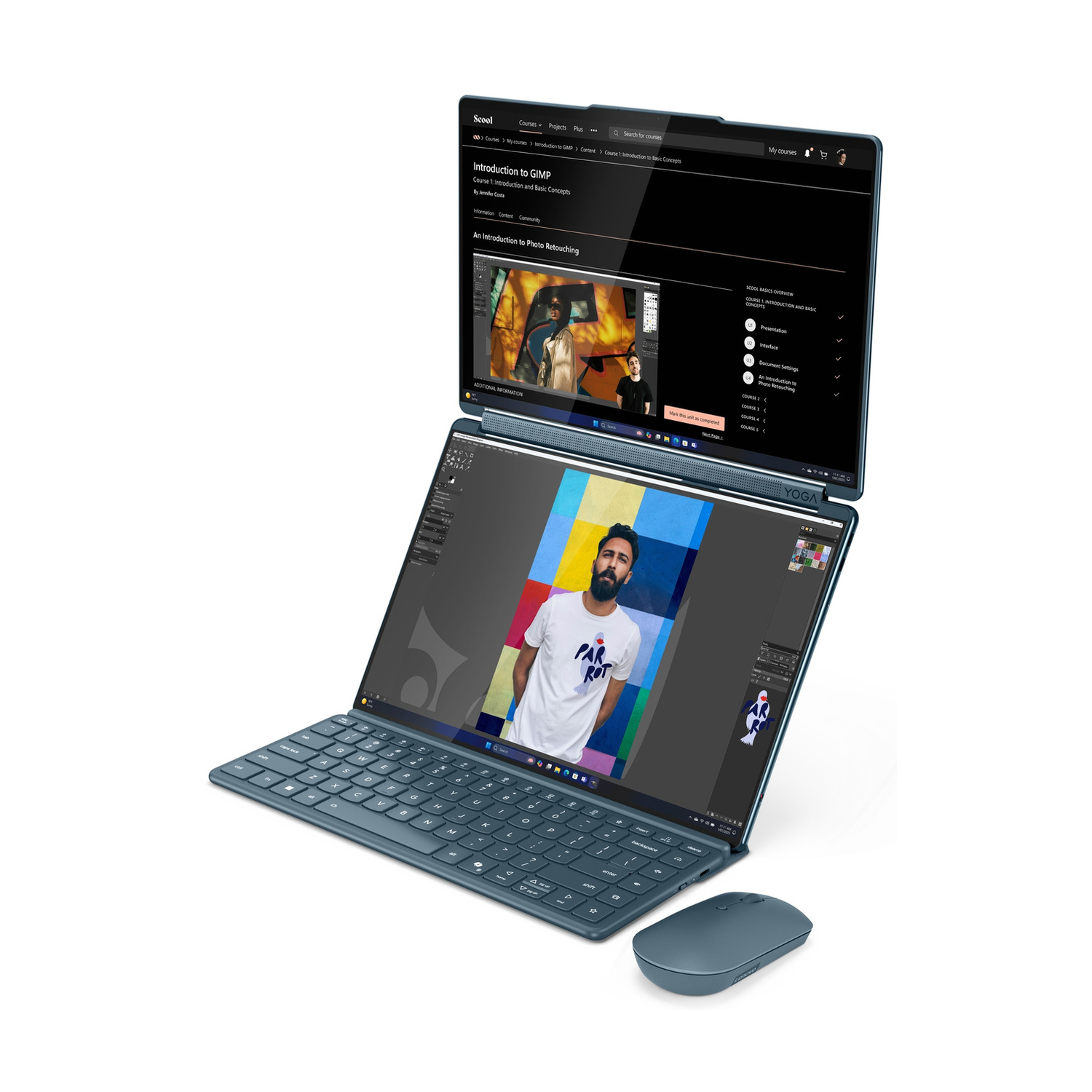 Un laptop blu petrolio con due schermi e un mouse, che mostra un uomo sullo schermo.