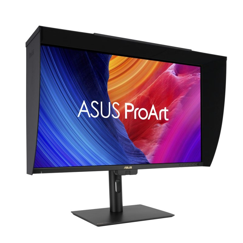 Un monitor ASUS ProArt negro que muestra un fondo de pantalla abstracto colorido.