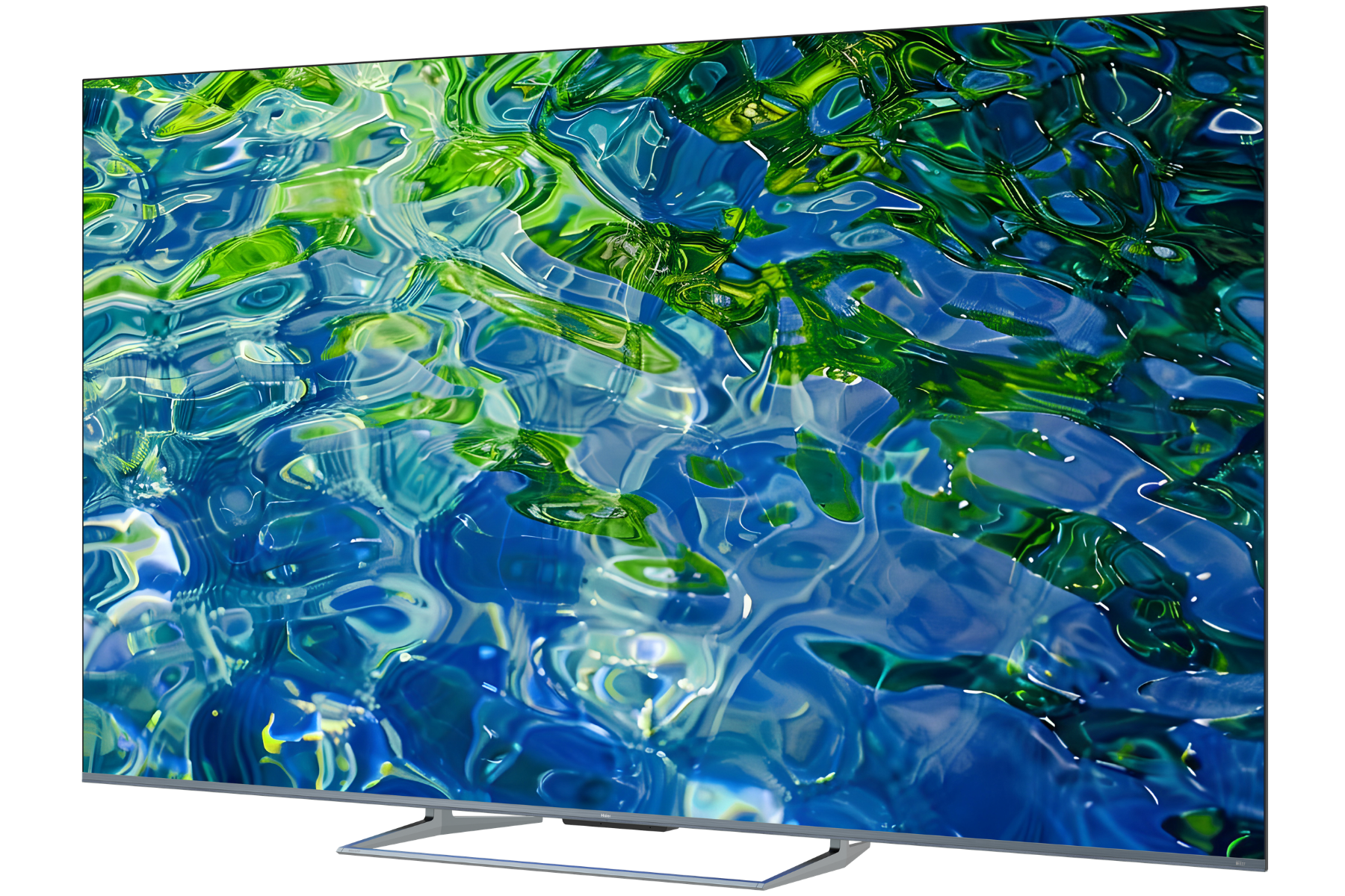 Un televisor moderno con una imagen vibrante de agua con hojas verdes.