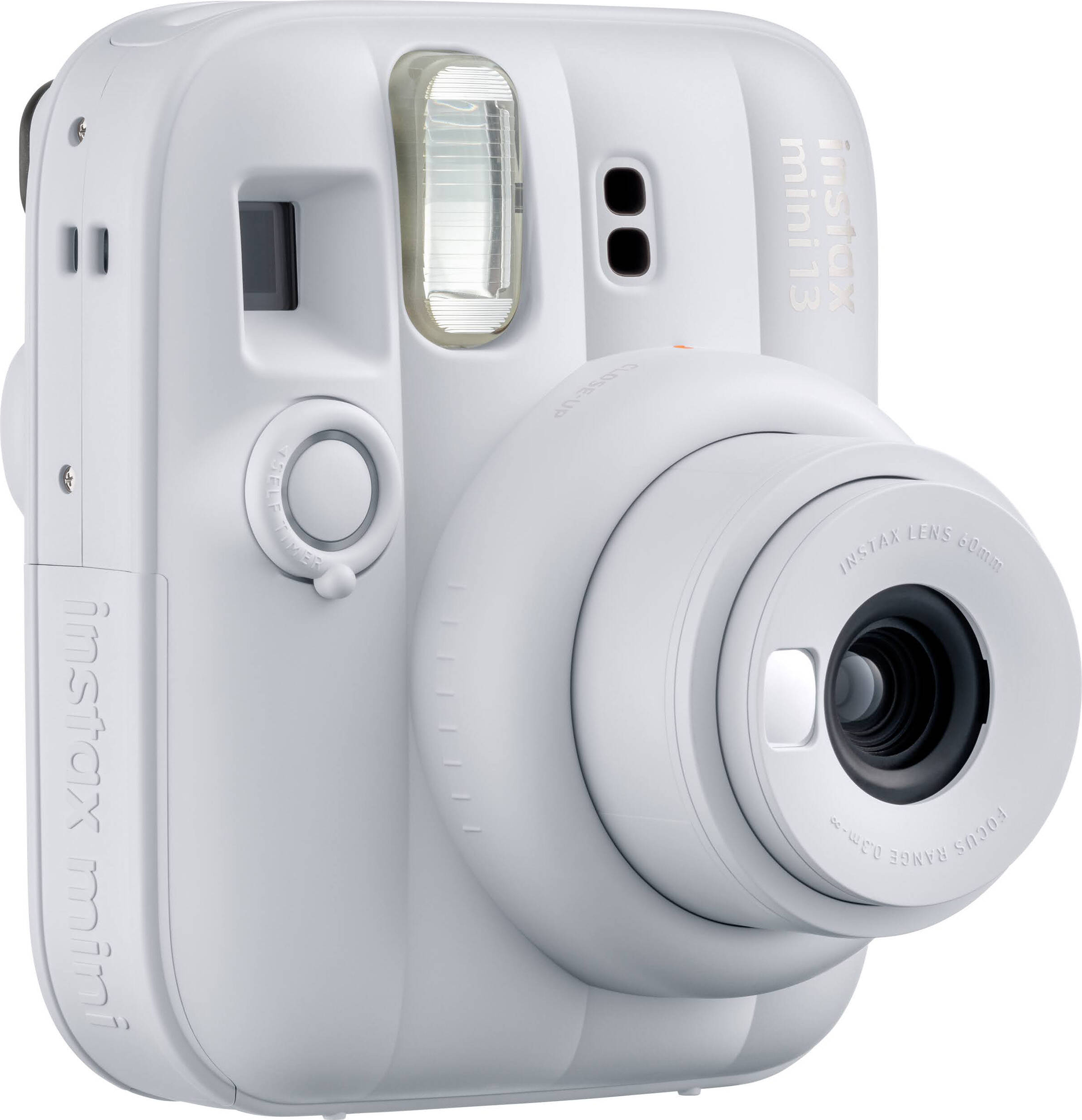 Eine weiße Instax Mini 13 Sofortbildkamera mit einem Objektiv.