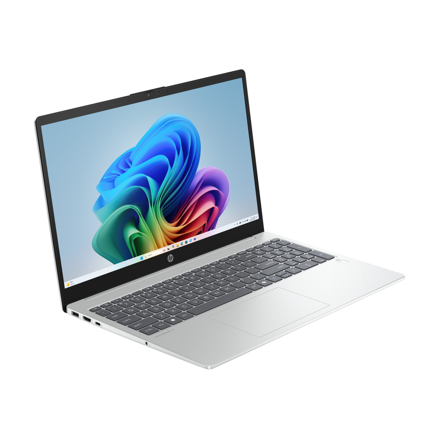 Laptop argentato con tastiera, touchpad e sfondo colorato sullo schermo.