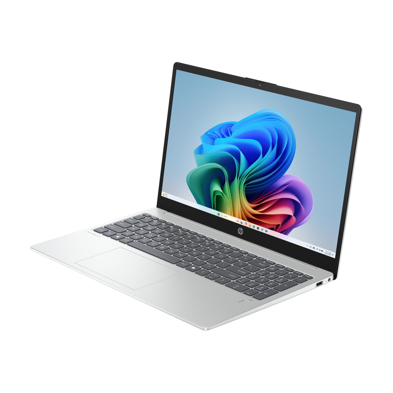 Un laptop argentato con uno sfondo colorato di Windows visualizzato sullo schermo.