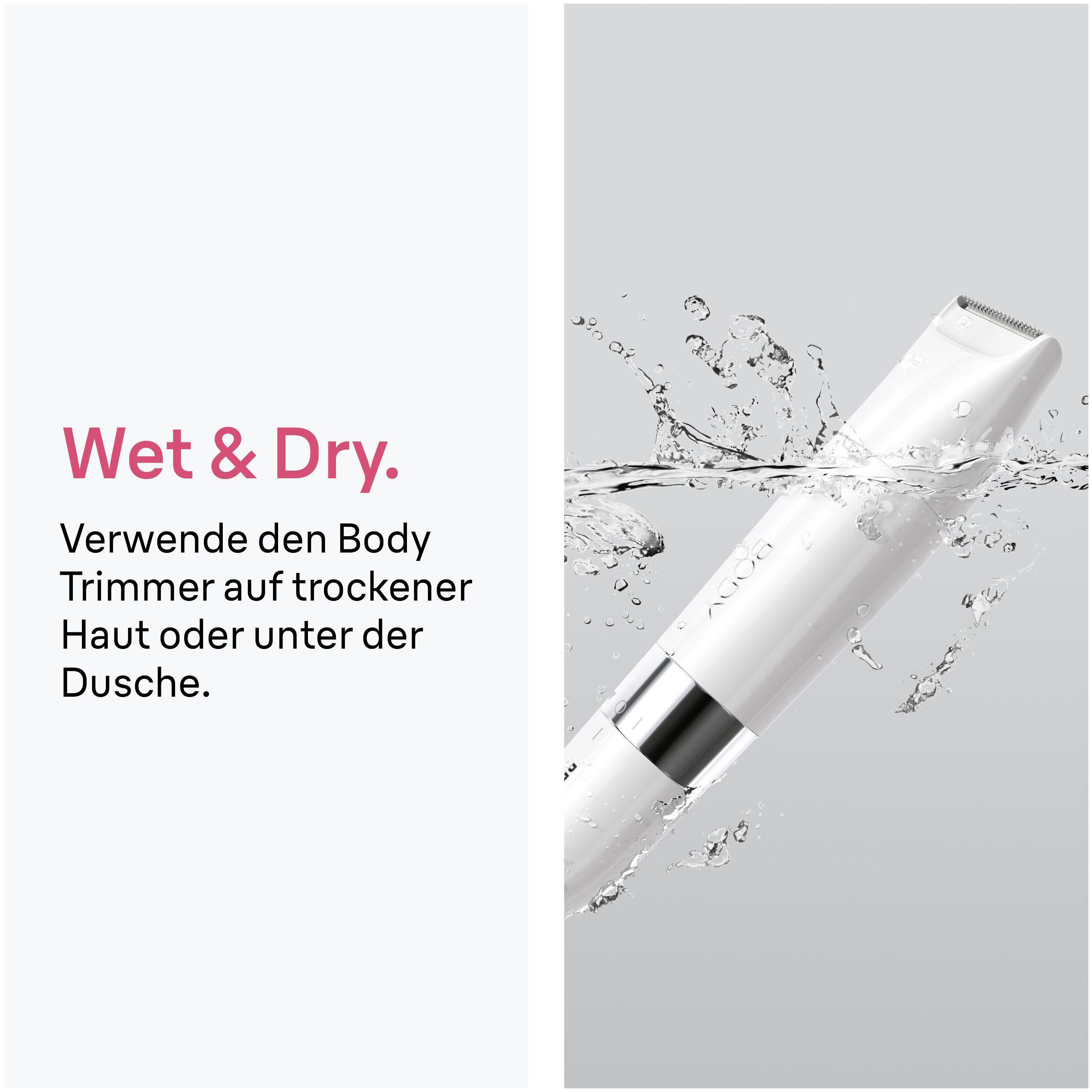Ein weißer Body Trimmer taucht in Wasser ein mit Spritzern.
