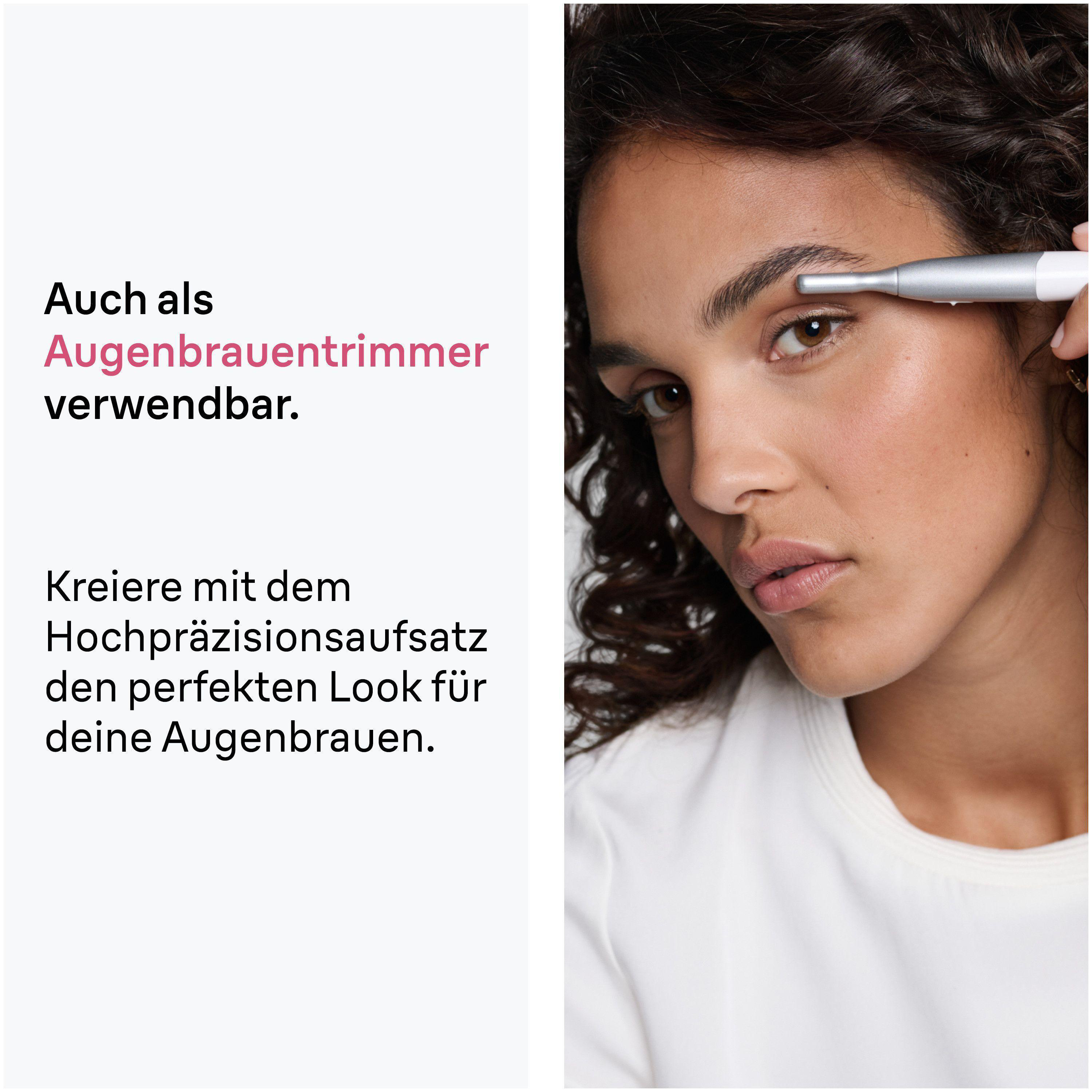 Eine Frau benutzt einen silbernen Trimmer am Auge für die Augenbrauen.