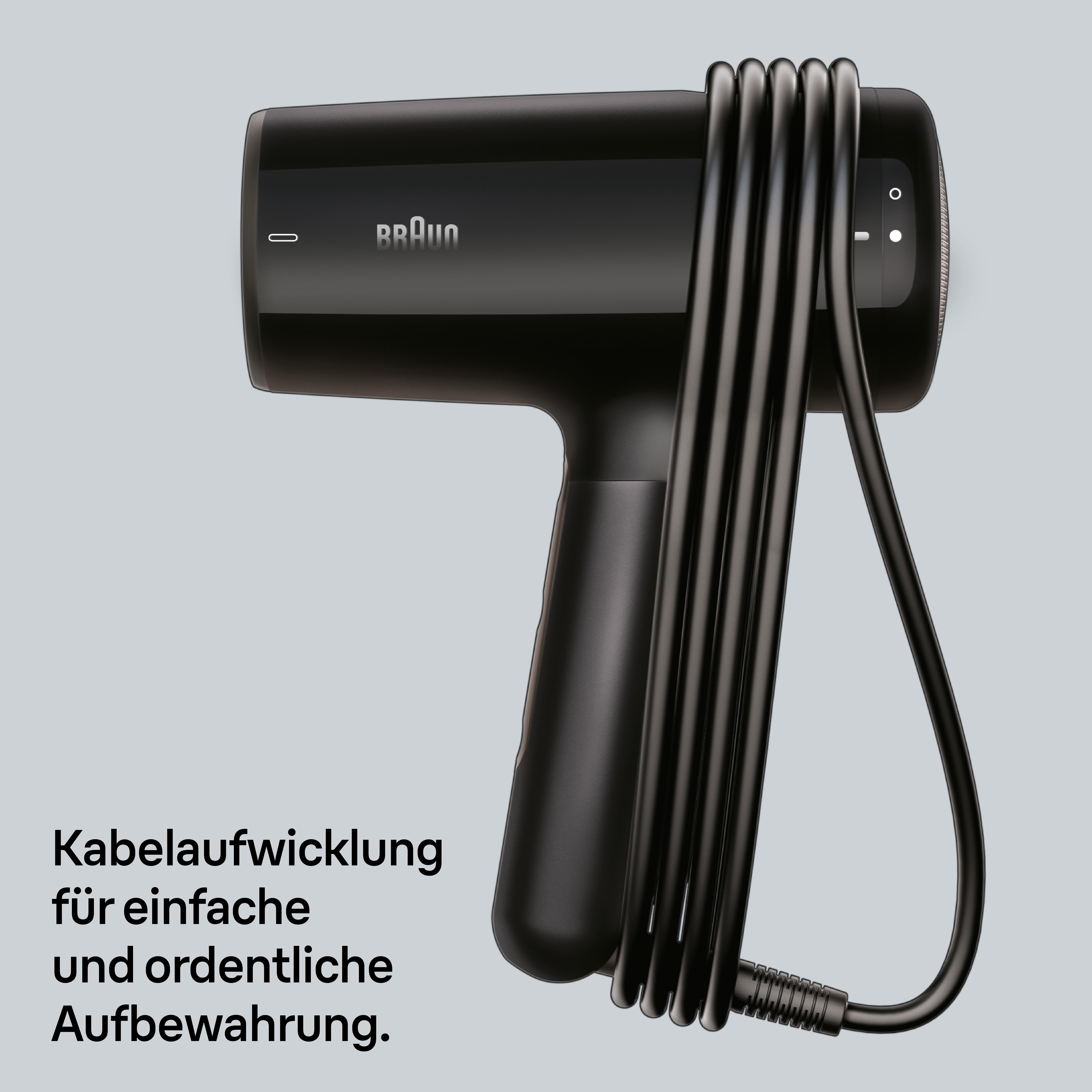 Schwarzer Braun Haartrockner mit aufgewickeltem Kabel auf grauem Hintergrund.