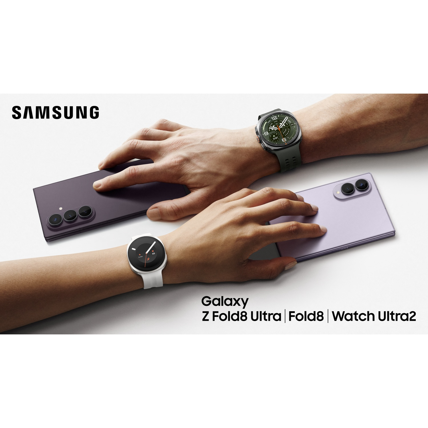 Samsung logo above two hands holding a purple and a lavender smartphone.