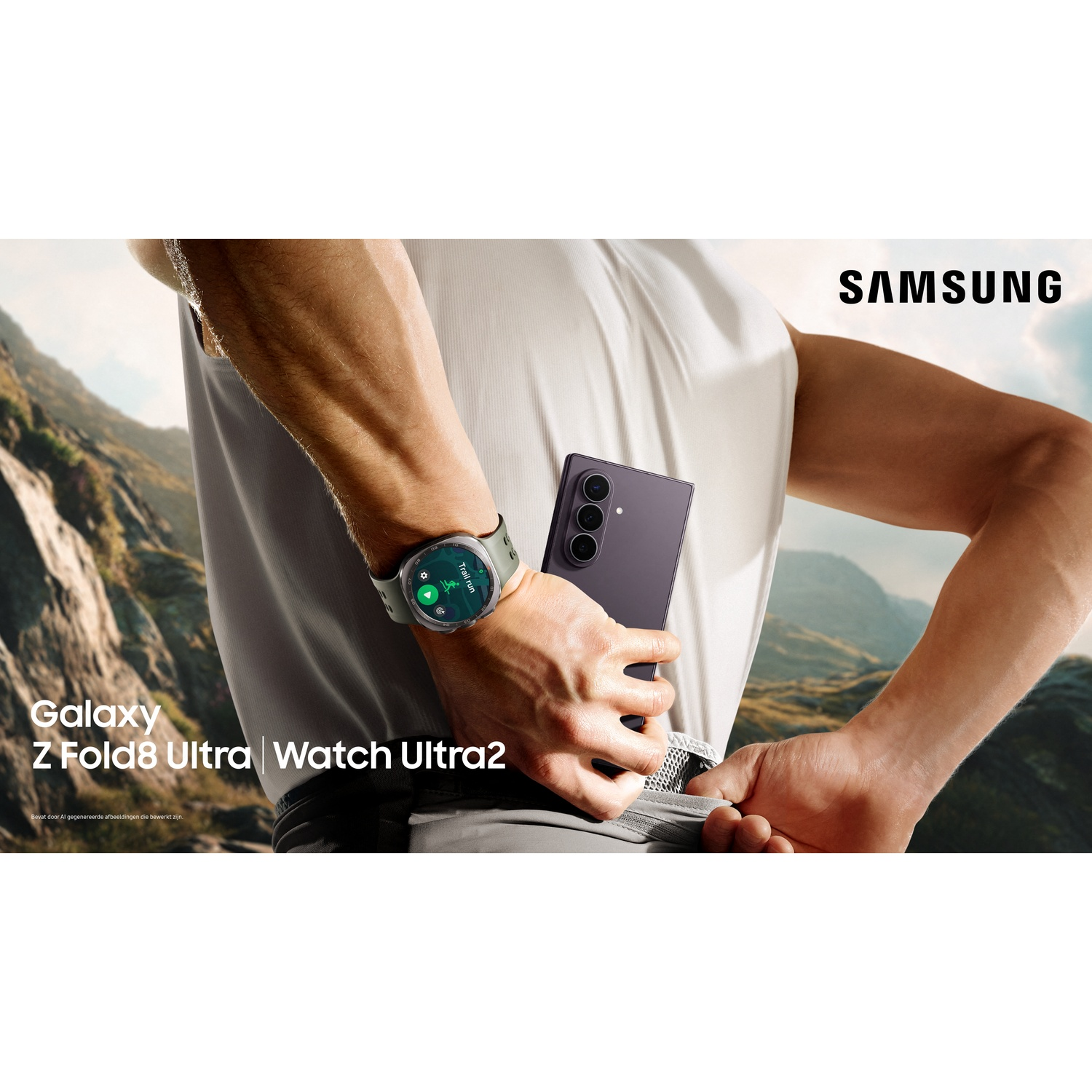 A man in a mountain setting stows a smartphone and wears a smartwatch.