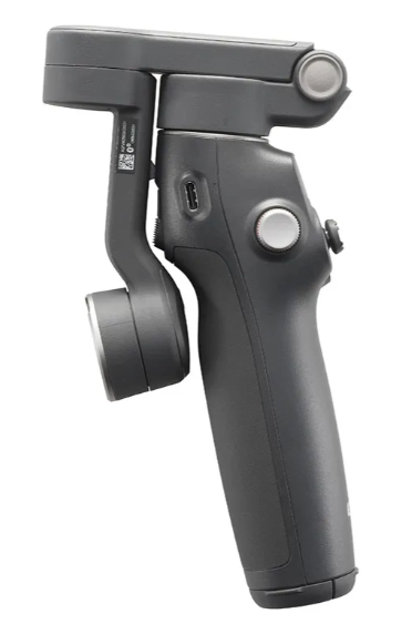 Szary gimbal z uchwytem, przyciskiem i portem USB na białym tle.
